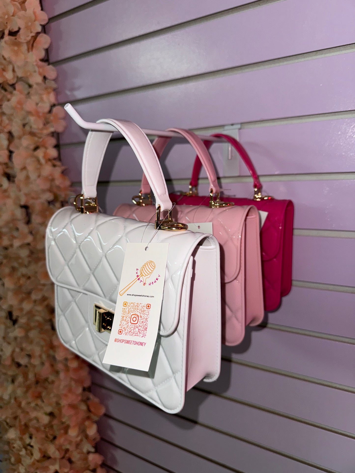 Cartera de mano acolchada de PU sólida